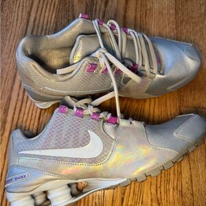 Nike Women's Silver Iridescent Athletic Shoes with Pink Accents